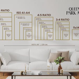 May include: A living room scene with a white sofa, coffee table, and a wall displaying framed art size guides. The guides include dimensions in inches and centimeters for various ratios, such as 2:3, 4:5, and 3:4. The text "QUEEN'S PARK AVE" is visible.
