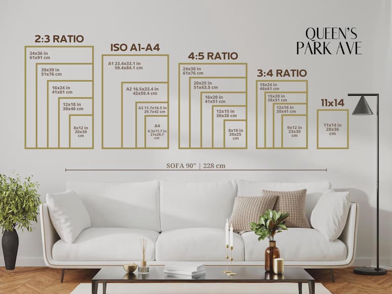 May include: A living room scene with a white sofa, coffee table, and a wall displaying framed art size guides. The guides include dimensions in inches and centimeters for various ratios, such as 2:3, 4:5, and 3:4. The text "QUEEN'S PARK AVE" is visible.