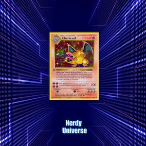 May include: A Charizard Pokémon trading card. The card features a vibrant illustration of the fire-type Pokémon. The card has a holographic background and includes the text "Charizard" and "120 HP". The card is from the "Nerdy Universe" collection.