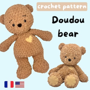 May include: Crochet pattern for a Doudou bear. The pattern includes instructions for making a brown teddy bear with a heart on its chest. The pattern is available in both English and French.