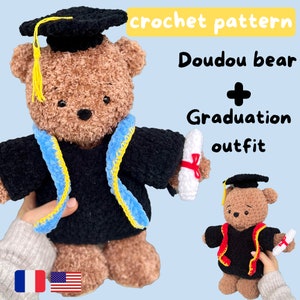 May include: Crochet pattern for a Doudou bear wearing a graduation outfit. The bear is brown with a black graduation gown, blue and yellow trim, and a white graduation cap. The pattern includes instructions for making the bear and the outfit.