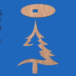 May include: A wooden cutout of a Christmas tree with a star on top. The tree is brown and has a simple design. The star is also brown and has a square hole in the center.