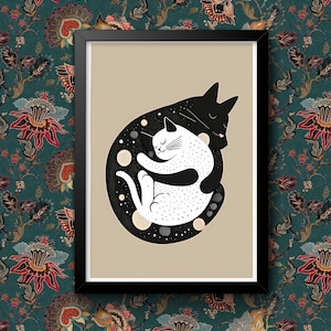 May include: A black and white illustration of two cats curled up together, with a starry night sky background. The cats are in a circle shape, with the black cat on the outside and the white cat on the inside.