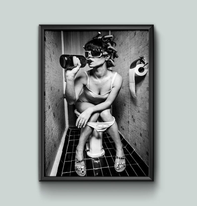 Funny retro-style bathroom photo – woman with curlers and sunglasses drinking on toilet, black and white wall art