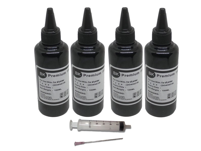 May include: Four black bottles of printer ink labeled "BK Premium" with a syringe and needle for refilling. Each bottle contains 100 ml of universal ink.