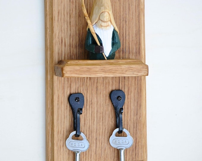 Hand Carved Nisse on Oak shealf for local pickup in Borensberg. Nordic folklore meets function in tis handcrafted key holder.