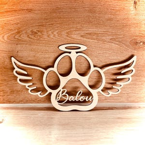 Patte de chien avec ornement d'ailes DXF, SVG, AI, pour découpe laser, fraisage, plasma ou jet d'eau