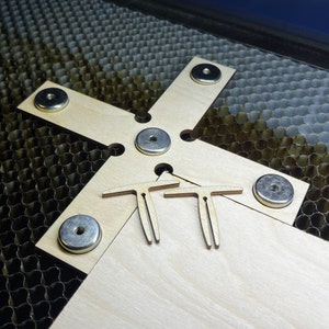 Laser Fixture Set and Honeycomb Bed Pins, provided in DXF, SVG, and Lightburn file formats for DIY laser cutting