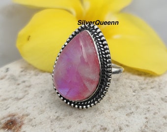 Anello con pietra di luna blu fuoco: fascia in argento sterling 925 realizzata a mano.