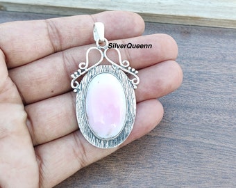 Ciondolo ovale con opale rosa: incastonatura a castone in argento sterling 925