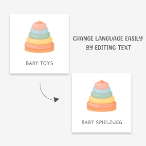 Pu&ograve; includere: Un giocattolo impilabile colorato per bambini, con anelli in tonalit&agrave; pesca, giallo, blu e verde, sormontato da una piccola sfera pesca. Il testo "BABY TOYS" &egrave; visualizzato sotto. &Egrave; presente anche il testo "CHANGE LANGUAGE EASILY BY EDITING TEXT".