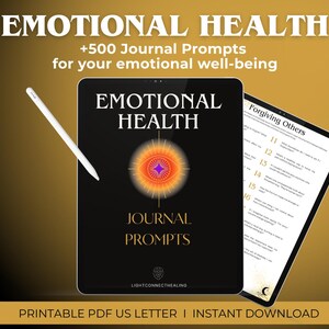 May include: A digital tablet displaying a black and gold cover with the text "Emotional Health" and "Journal Prompts". The cover features a stylized eye with orange, red, and purple colors. The tablet is on a gold background with a white stylus next to it. A portion of a page from the journal is visible, showing the text "Forgiving Others" and a list of journal prompts.