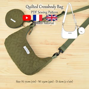 May include: A green quilted crossbody bag with a heart pattern. The bag has a detachable strap and a small round zippered pouch. The bag measures 7 inches tall, 9 inches wide, and 2.5 inches deep. The image includes the text "Quilted Crossbody Bag", "PDF Sewing Pattern", "Video Tutorial", and "Size: H: 17cm (7in) - W: 23cm (9in) - D: 6cm (2 1/2in)".