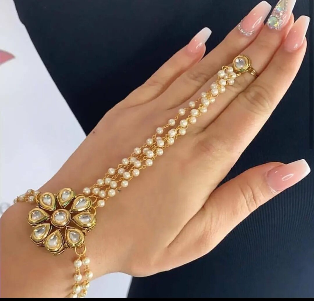I Jewels Kundan Bracelet with Pearl Chain Ring Handchain Hath phool for  Women (PIJ006LW) (Gold) : Amazon.in: Jewellery