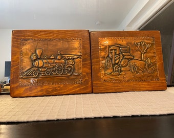 Pair of Vintage pressed cooper train and tracker art work.