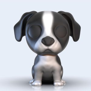 Op de afbeelding: Een zwart-witte cartoonhond figuur met een zilveren afwerking. De hond zit met zijn poten onder zijn lichaam en heeft een schattige, vriendelijke uitdrukking.
