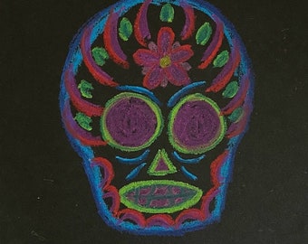 colorful skull on black paper