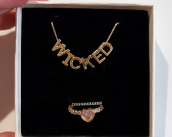 Wicked Necklace & 2-Ring Set, Broadway Musical Jewelry Gift, Gold Letter Necklace, Pink Heart Ring, Emerald Stacking Band