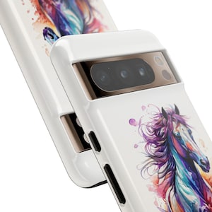 May include: White phone case featuring a watercolour design of a purple and blue horse. The case has a raised camera bump with three lenses.