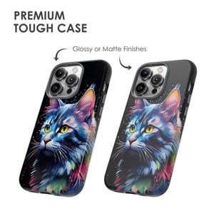 May include: Two phone cases featuring a colourful abstract cat design. The cases are black and have a glossy or matte finish. The cases are for an iPhone with a triple camera lens.