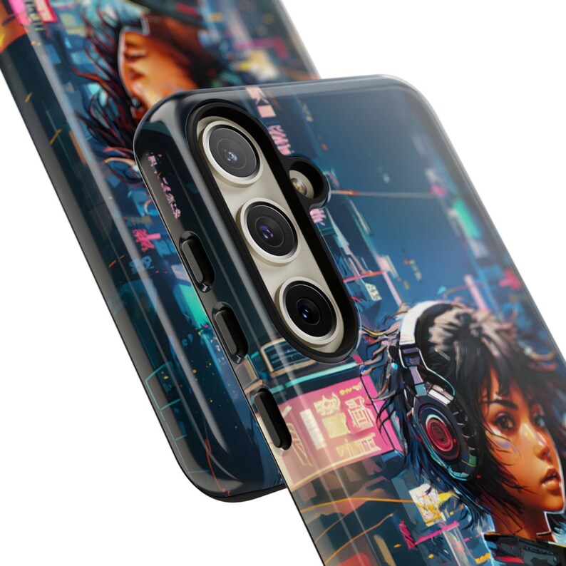 May include: A black phone case with a colourful cyberpunk design featuring a woman with headphones. The case has a clear back and a black camera bump with three lenses.