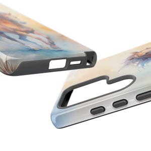 May include: A phone case featuring a watercolour painting of a horse on a light blue background. The case has a black bumper and a clear back.