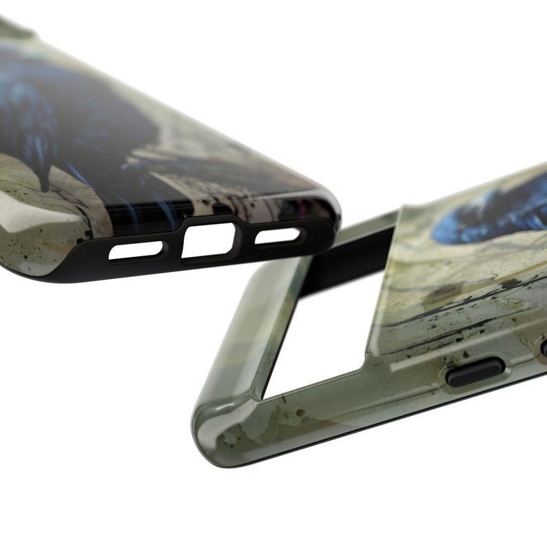 May include: Two phone cases with a black rubber edge and a colorful abstract design. The cases are made of a hard plastic material and have a glossy finish.