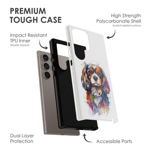 May include: A white phone case featuring a watercolour painting of a Cavalier King Charles Spaniel dog. The case is made from a high-strength polycarbonate shell and has a TPU inner layer for impact resistance. The case has accessible ports and a scratch-resistant surface.
