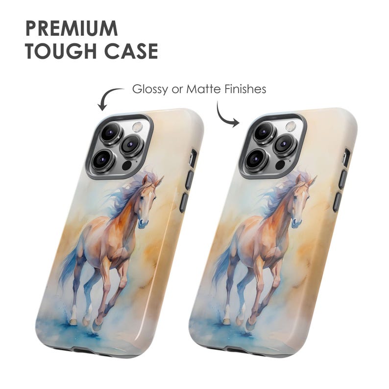 May include: Two phone cases featuring a watercolour painting of a brown horse running. The cases are white with a glossy or matte finish. The phone cases are for an iPhone 14 Pro Max.