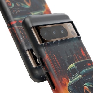 May include: A black phone case with a vintage car and city skyline design. The case has a raised camera bump with three lenses.