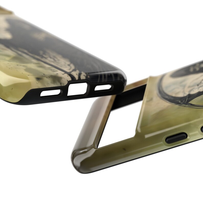 May include: Two phone cases with a black and green camouflage pattern. The cases are made of a hard plastic material and have a raised edge around the camera lens.