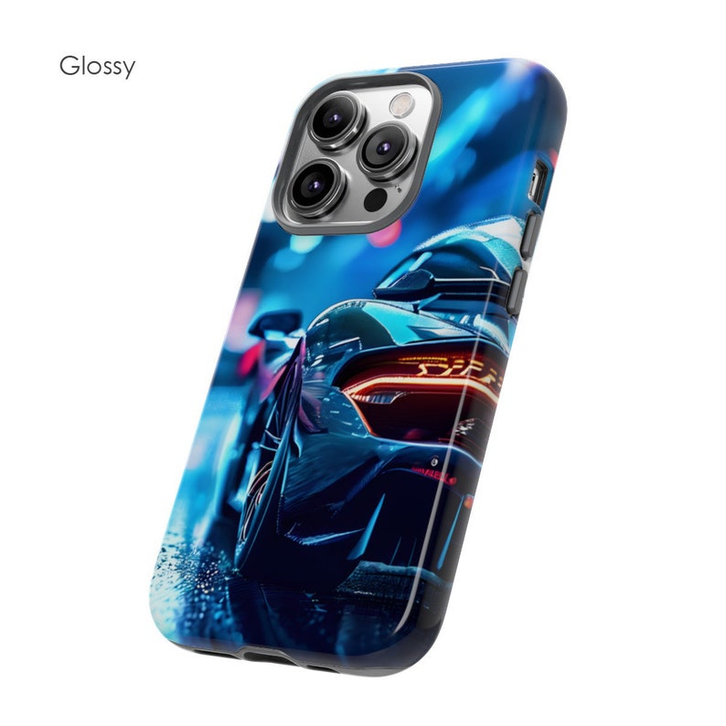 May include: A glossy phone case featuring a blue and black sports car design. The case has a camera cutout and a black border.