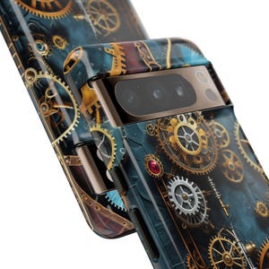 May include: A phone case with a steampunk design featuring gold and silver gears on a blue background.