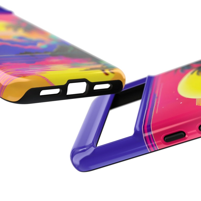 May include: Two phone cases featuring a colourful sunset and palm tree design. The case on top is yellow, pink and blue. The case on the bottom is purple, pink and yellow.