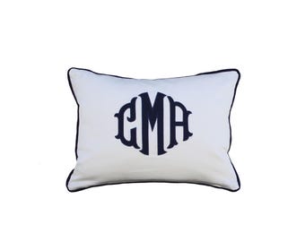 May include: White rectangular pillow with a navy blue monogram and trim. The monogram features the letters GMA in a decorative font, centered on the pillow. The pillow has a clean, classic design.
