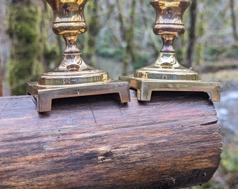 Pair of two vintage brass tapered candle holders marked "EB"