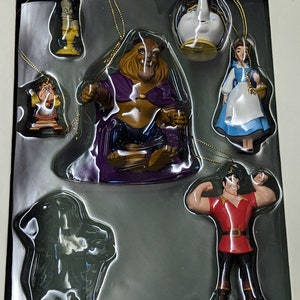 Conjunto de 6 enfeites da Disney do livro de histórias da Bela e a Fera (faltando Maurice)