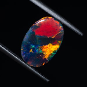 1.40 Carat Black Opal Oval Cabochon Lightning Ridge Australia