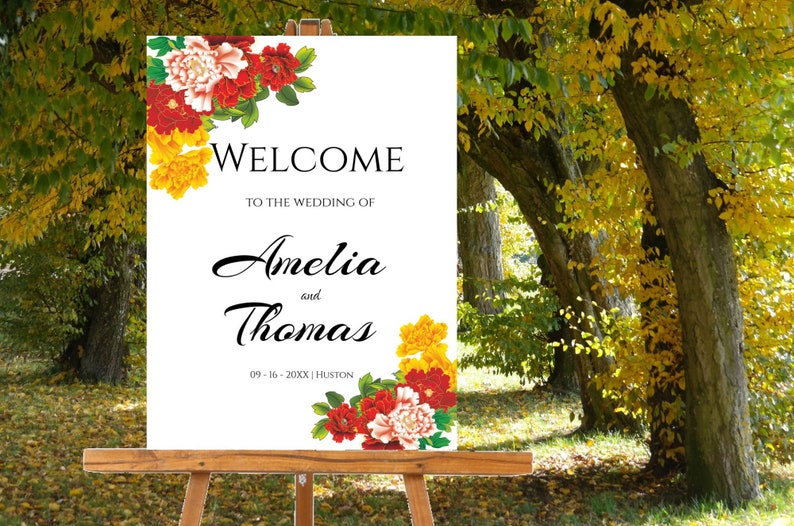 Pode incluir: Placa de boas-vindas com flores vermelhas e amarelas, com o texto "Bem-vindos ao casamento de Amelia e Thomas, 09-16-20XX, Houston."