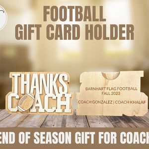 May include: Wooden gift card holder with the words "Thanks Coach" and a football graphic. The holder also has the text "Barnheart Flag Football Fall 2023 Coach Gonzalez | Coach Khalaf" and the words "End of Season Gift for Coach".