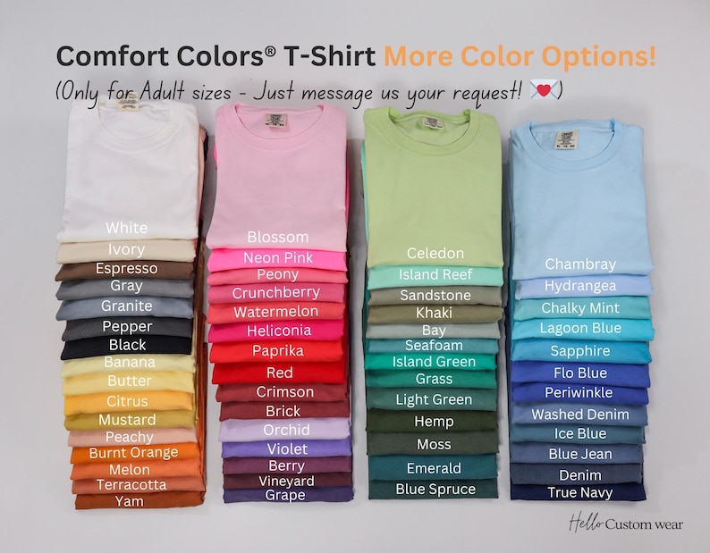 Op de afbeelding: Een kleurenkaart voor T-shirts van Comfort Colors&reg;. De kaart toont 20 verschillende kleuren in drie kolommen. De kleuren zijn gelabeld met namen zoals "Wit", "Ivoor", "Espresso", "Grijs", "Graniet", "Peper", "Zwart", "Banaan", "Boter", "Citrus", "Mosterd", "Perzik", "Gebrande Oranje", "Meloen", "Terracotta", "Yam", "Bloesem", "Neonroze", "Pioenroos", "Bosbes", "Watermeloen", "Heliconia", "Paprika", "Rood", "Koraalrood", "Baksteen", "Orchidee", "Violet", "Bes", "Wijngaard", "Druif", "Celedon", "Koraalrif", "Zandsteen", "Kaki", "Baai", "Zeeschuim", "Eilandgroen", "Gras", "Lichtgroen", "Hennep", "Mos", "Smaragd", "Blauwe spar", "Chambray", "Hortensia", "Krijtwitte munt", "Laguneblauw", "Saffier", "Flo Blue", "Blauwe ereprijs", "Gewassen denim", "IJsblauw", "Jeansblauw", "Denim", "Donkerblauw".