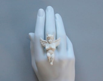 Ring with white angel and devil