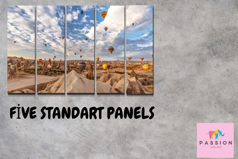 May include: A five-panel canvas print featuring a scenic landscape of hot air balloons floating over a rocky, desert-like terrain. The sky is a vibrant blue with fluffy white clouds. The print is titled "FIVE STANDART PANELS".