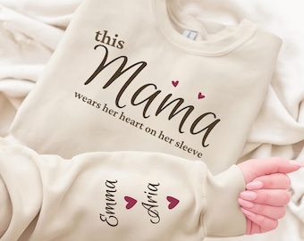 Custom This Mama Wears Her Heart On Her Sleeve Hoodie, Personalized Mom Sweatshirt With Kids Names, Cute Momma Outfit, Mothers Day Gifts