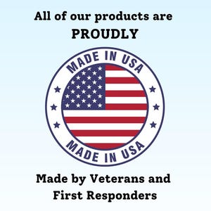 May include: A red, white, and blue American flag inside a circle with the text "Made in USA" in blue lettering. The text "Proudly" is above the circle and the text "Made by Veterans and First Responders" is below the circle.