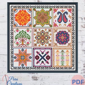 May include: A framed cross-stitch pattern featuring nine colorful, geometric designs. The designs include floral, star, and paisley motifs in shades of orange, blue, green, and pink. The frame is black, and the background is a white brick wall. The text "Pura Creations" and "PDF" are visible.