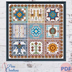 May include: A square cross-stitch pattern framed in black, featuring a grid of nine distinct panels. The designs include geometric shapes, two llamas, a stylized bird, a tree, and a sun, all rendered in vibrant blue, red, yellow, and green threads.