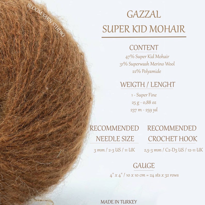 May include: A ball of brown Super Kid Mohair yarn by Gazzal. The yarn is 47% Super Kid Mohair, 31% Superwash Merino Wool, and 22% Polyamide. The recommended needle size is 3 mm/2-3 US/11 UK. The recommended crochet hook size is 2.5-3 mm/C2-D3 US/12-11 UK. The gauge is 24 stitches and 32 rows per 10 cm.