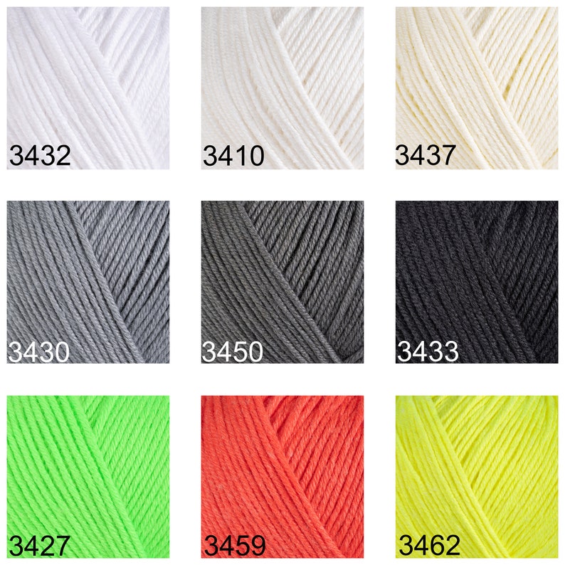May include: Nine yarn skeins in various colors, including white, cream, gray, black, neon green, orange, and yellow. Each skein is labeled with a number, such as 3432, 3410, 3437, 3430, 3450, 3433, 3427, 3459, and 3462.