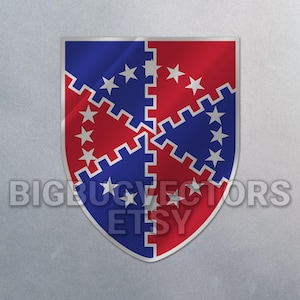 May include: A blue and red shield with a white star pattern. The shield is divided into two sections, one blue and one red, with a white star pattern in each section. The shield is a symbol of the Confederate States of America.